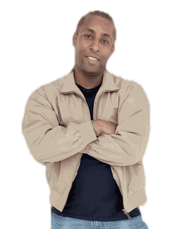 David Roland, founder of David Roland Design, arms crossed in a tan jacket